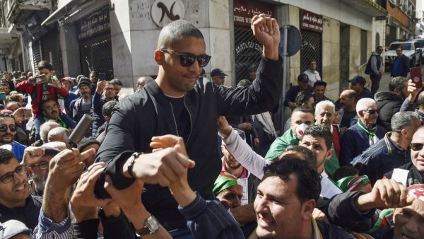  August 3, the trial opened of Algerian journalist Khaled Drareni, who has become a figurehead of press freedom in the North African country, with the prosecution calling for a four-year prison term. RYAD KRAMDI / AFP