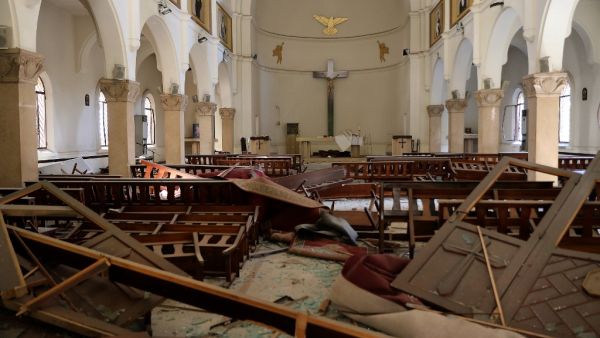 The interior of a church is pictured in the aftermath of yesterday's blast that tore through Lebanon's capital and resulted from the ignition of a huge depot of ammonium nitrate at Beirut's port, on August 5, 2020. AFP
