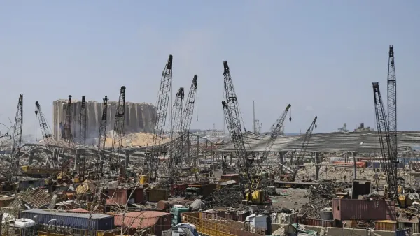 The grain silo at Beirut's port is pictured amid the rubble and debris in the aftermath of yesterday's blast that tore through Lebanon's capital and resulted from the ignition of a huge depot of ammonium nitrate at the port, on August 5, 2020. Rescuers searched for survivors in Beirut after a cataclysmic explosion at the port sowed devastation across entire neighbourhoods, killing more than 100 people, wounding thousands and plunging Lebanon deeper into crisis. The blast, which appeared to have been caused 
