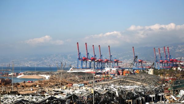 A picture shows destruction at Beirut port on August 5, 2020 in the aftermath of a massive explosion in the Lebanese capital. Rescuers searched for survivors in Beirut after a cataclysmic explosion at the port sowed devastation across entire neighbourhoods, killing more than 100 people, wounding thousands and plunging Lebanon deeper into crisis. The blast, which appeared to have been caused by a fire igniting 2,750 tonnes of ammonium nitrate left unsecured in a warehouse, was felt as far away as Cyprus, som