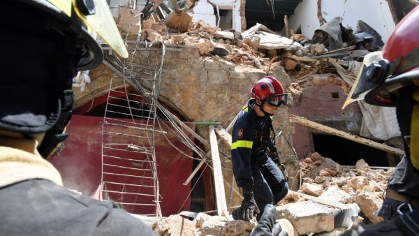 A French rescuer stands amidst the rubble of a building in the Gemayzeh neighbourhood on August 6, 2020, two days after a massive explosion in the Beirut port shook the capital. The blast caused massive destruction and killed at least 113 people, heaping misery on a country in crisis. AFP