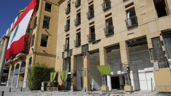 A view shows the damaged exterior of the Le Gray hotel, after clashes the night before following a demonstration against a political leadership they blame for a monster explosion, in downtown Beirut on August 9, 2020. ANWAR AMRO / AFP