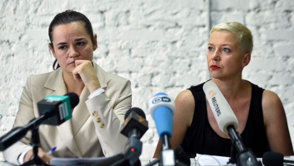 Presidential candidate Svetlana Tikhanovskaya and her ally Maria Kolesnikova hold a press conference the day after Belarus' presidential election in Minsk on August 10, 2020. Sergei GAPON / AFP