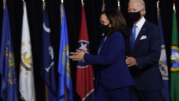 Democratic presidential nominee and former US Vice President Joe Biden (L) and vice presidential running mate, US Senator Kamala Harris, arrive to conduct their first press conference together in Wilmington, Delaware, on August 12, 2020. Olivier DOULIERY / AFP