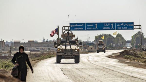US forces patrol the area of the town of Tal Tamr, in Syria's northeastern Hasakeh province, on August 17, 2020. DELIL SOULEIMAN / AFP