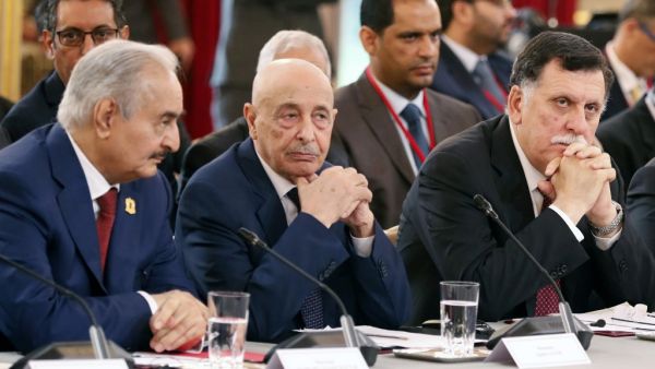 In this file photo taken on May 29, 2018 (L to R) Libyan strongman Khalifa Haftar, speaker of the eastern-based parliament Aguila Saleh Issa, and head of the Tripoli-based UN-recognised unity government Fayez al-Sarraj, attend an International Congress on Libya at the Elysee Palace in Paris. Etienne LAURENT / POOL / AFP