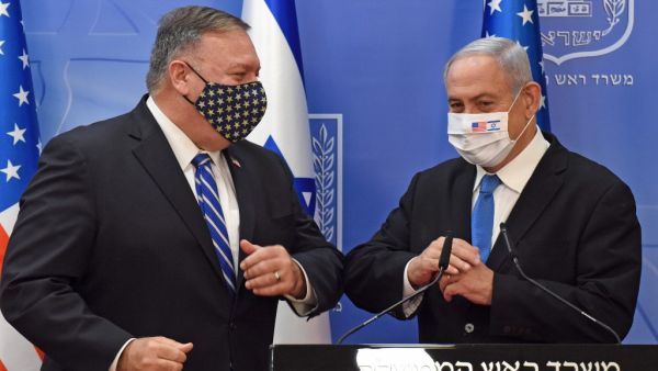 US Secretary of State Mike Pompeo (L) and Israeli Prime Minister Benjamin Netanyahu bump elbows ahead of making a joint statement to the press after meeting in Jerusalem, on August 24, 2020. (AFP)