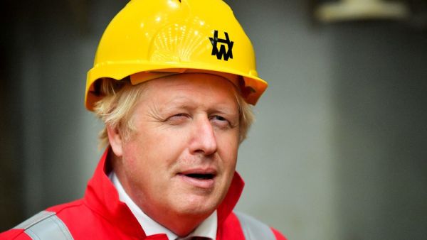 Britain's Prime Minister Boris Johnson gestures during his visit to Appledore Shipyard in south west England on August 25, 2020, as the historic shipyard announced it's re-opening having being bought by InfraStrata in a £7 million deal. Ben Birchall / POOL / AFP