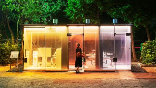 Shigeru Ban designs public toilets with colorful glass walls in Tokyo (Twitter)