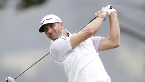 Dustin Johnson hits a tee shot on the 4th hole in the third round of the 102nd PGA Championship on Saturday at TPC Harding Park in San Francisco. (Photo: John Angelillo/UPI)