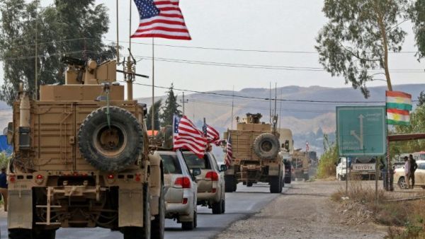 A convoy of US military vehicles withdrawing from northern Syria crossed into Iraqi Kurdistan on Monday (AFP Photo/SAFIN HAMED)