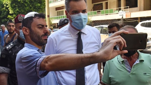 Lebanon's newly-appointed Prime Minister Mustapha Adib (C) visits Beirut's badly-hit Gemmayzeh neighbourhood, on August 31, 2020. Lebanon's under-fire political leaders designated a new prime minister, the diplomat Mustapha Adib, to tackle the country's deep political and economic crisis, hours before French President Emmanuel Macron was due to visit. AFP
