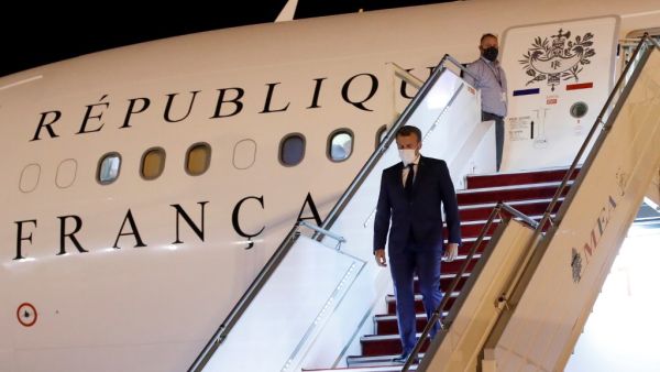 French President Emmanuel Macron arrives at Beirut International airport on August 31, 2020. Macron arrived in Beirut for his second visit since a deadly explosion on August 4 shook the nation and fuelled a drive for political change. Macron, who first flew to Beirut only two days after the blast, arrived at 9 pm (1800 GMT) for a two-day visit that will include a ceremony marking the centenary of Greater Lebanon. GONZALO FUENTES / POOL / AFP