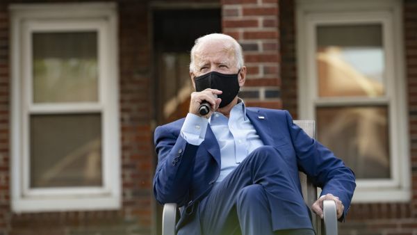 Democratic Presidential Candidate Joe Biden speaks with steelworkers during a backyard conversation in Detroit, Michigan, on September 9, 2020. JIM WATSON / AFP