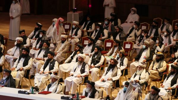 Members of the Taliban delegation attend the opening session of the peace talks between the Afghan government and the Taliban in the Qatari capital Doha on September 12, 2020. KARIM JAAFAR / AFP
