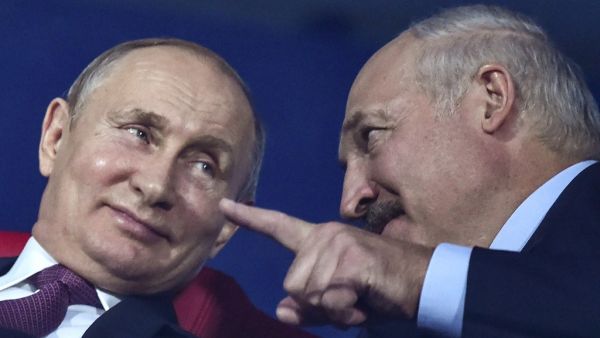 In this file photo taken on June 30, 2019 Russian president Vladimir Putin (L) and Belarus' president Alexander Lukashenko attend the closing ceremony of the 2019 European Games in Minsk. Russian President Vladimir Putin backed embattled Belarusian leader Alexander Lukashenko at talks on September 14, 2020, saying he was sure the Belarusian strongman would see through proposed reforms. "I'm sure that considering your experience... work in this direction will be organised at the highest level and allow the d