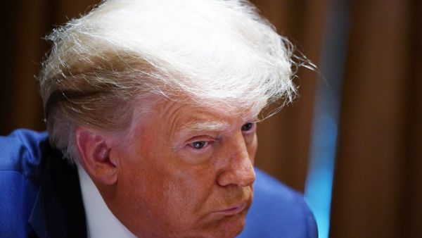 US President Donald Trump listens during a discussion with state attorneys general on protection from social media abuses in the Cabinet Room of the White House in Washington, DC, on September 23, 2020. MANDEL NGAN / AFP