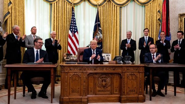 U.S. President Donald Trump (C) participates in a signing ceremony and meeting with the President of Serbia Aleksandar Vucic (L) and the Prime Minister of Kosovo Avdullah Hoti (R) in the Oval Office of the White House on September 4, 2020 in Washington, DC. The Trump administration is hosting the leaders to discuss furthering their economic relations. Anna Moneymaker-Pool/Getty Images/AFP POOL / GETTY IMAGES NORTH AMERICA / Getty Images via AFP