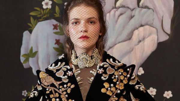 Traveling even if through dreams - Precious embroidery in threads of gold on an oversized bell sleeve jacket reminiscent of Flemish paintings AzziAndOsta (Instagram)