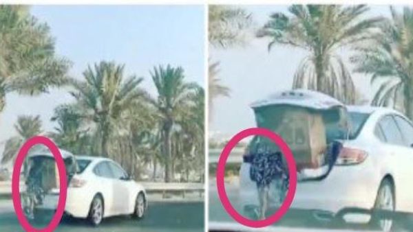 فتاة تضع الخادمة في صندوق السيارة