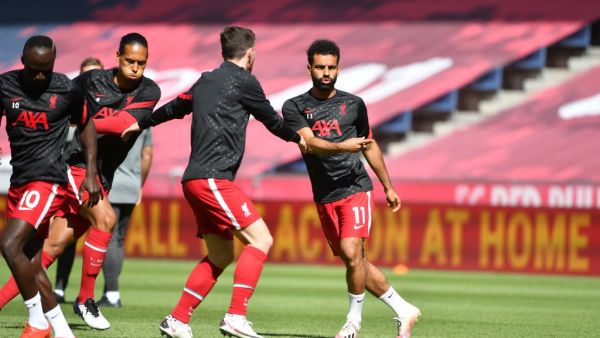 The Reds centre-back was quick to stress that the club has never lost faith in the quality of their Egyptian star (Photo: AFP)