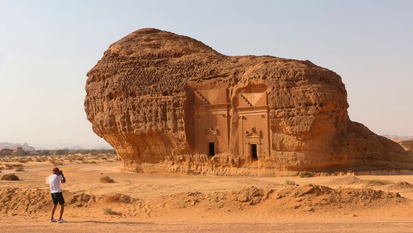 Al-Ula, Saudi Arabia: A tourist photographs Area C tombs at Madain Saleh Heritage Site. (Shutterstock/ File Photo)