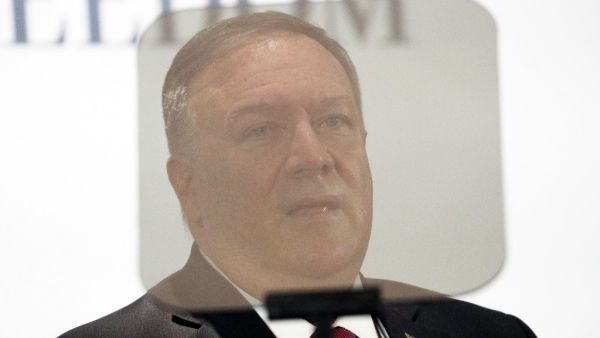 US Secretary of State Mike Pompeo is pictured through a teleprompter as he delivers remarks at a Holy See Symposium on Advancing and Defending Religious Freedom through Diplomacy on September 30, 2020 in Rome. US Secretary of State Mike Pompeo renewed an appeal on September 30, 2020 for the Vatican to take a stand against China, pushing a religious freedom theme used in President Donald Trump's re-election campaign. GUGLIELMO MANGIAPANE / POOL / AFP