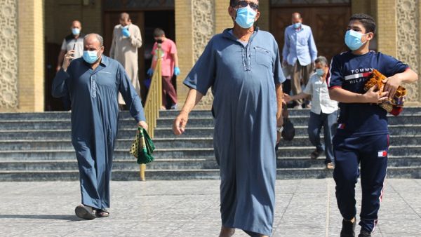Iraqi Sunni Muslims leave al-Firdous Mosque in Baghdad at the end of the Friday prayer on October 9, 2020, as Iraqi authorities allowed group prayers in mosques with social distancing for the first time since a lockdown was imposed to fight the coronavirus pandemic. Iraq registered more than 390,000 Covid-19 infections so far in the pandemic, according to religious authorities in the country where the novel coronavirus has claimed some 10,000 lives since the winter. AHMAD AL-RUBAYE / AFP