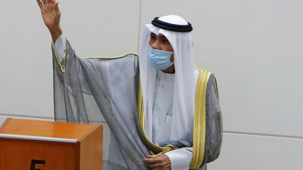 Emir of Kuwait Sheikh Nawaf al-Ahmad al-Jaber al-Sabah gestures in greeting upon arrival to attend the opening of the 5th regular session at the country's National Assembly (parliament) in Kuwait City on October 20, 2020. YASSER AL-ZAYYAT / AFP