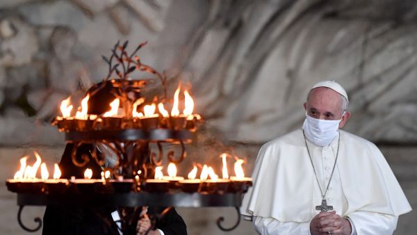Pope Francis wearing a face mask attends a ceremony for peace with representatives from various religions in Campidoglio Square in Rome on October 20, 2020. Andreas SOLARO / AFP