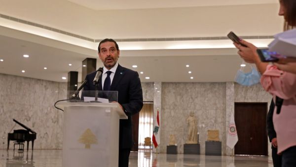 Former Lebanese prime minister Saad Hariri delivers a statement after the president named him to form a new cabinet, at the presidential palace in Baabda, east of the capital Beirut, on October 22, 2020. President Michel Aoun today named Hariri to form a new cabinet to lift the country out of crisis after most parliamentary blocs backed his nomination. Hariri, who has previously led three governments in Lebanon, stepped down almost a year ago under pressure from unprecedented protests against the political 