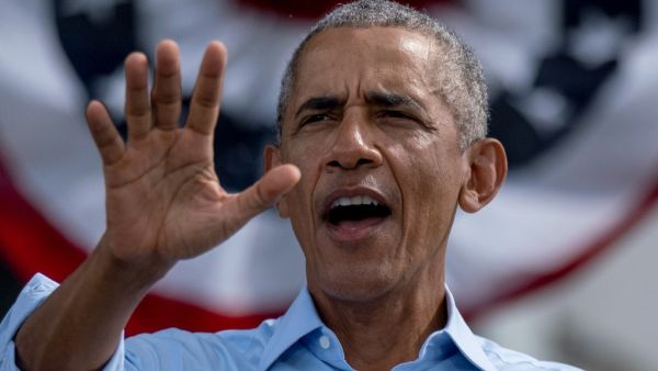Former US President Barack Obama speaks at a Biden-Harris drive-in rally in Orlando, Florida on October 27, 2020. Ricardo ARDUENGO / AFP
