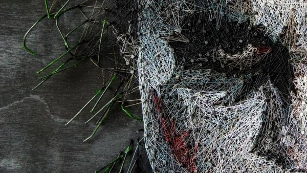 Konstantin says that unlike other artists he knows, he doesn't create with works using a plan, instead using the thread as a pencil and drawing his creations as he weaves it round the various nails. Pictured, Heath Ledger as the Joker (Instagram)