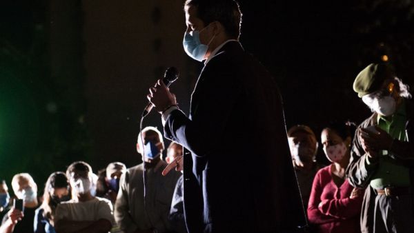 Venezuelan opposition leader Juan Guaido addresses supporters during a rally in the Terrazas del Avila neighborhood, in Caracas, Venezuela, on November 12, 2020, amid the Covid-19 pandemic. Cristian Hernandez / AFP