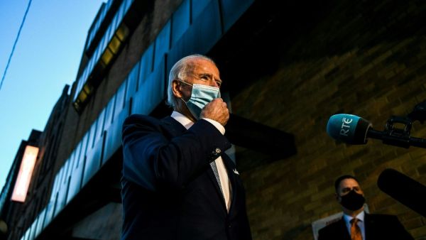 US President-elect Joe Biden talks to the media outside the Queen theatre after announcing the new members of his cabinet during an event in Wilmington, Delaware, on November 24, 2020. CHANDAN KHANNA / AFP