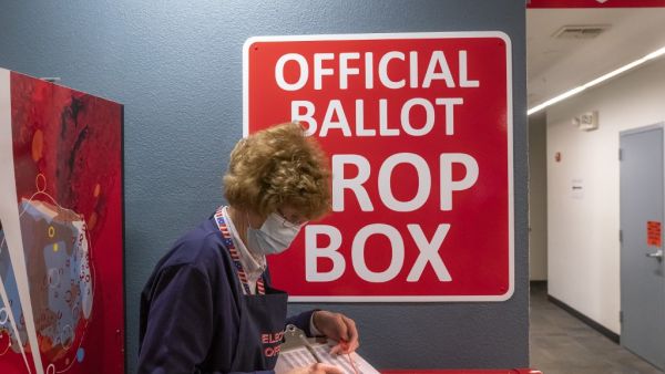 After a record-breaking early voting turnout, Americans head to the polls on the last day to cast their vote for incumbent U.S. President Donald Trump or Democratic nominee Joe Biden in the 2020 presidential election. Nathan Howard/Getty Images/AFP