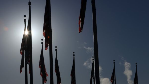 U.S. flags are seen on the ground of the Washington Monument in the morning hours of November 4, 2020 in Washington, DC. The nation awaits the results of a historic presidential election between President Donald Trump and his Democratic challenger, former Vice President Joe Biden with swing states still too close to call. Alex Wong/Getty Images/AFP ALEX WONG / GETTY IMAGES NORTH AMERICA / Getty Images via AFP