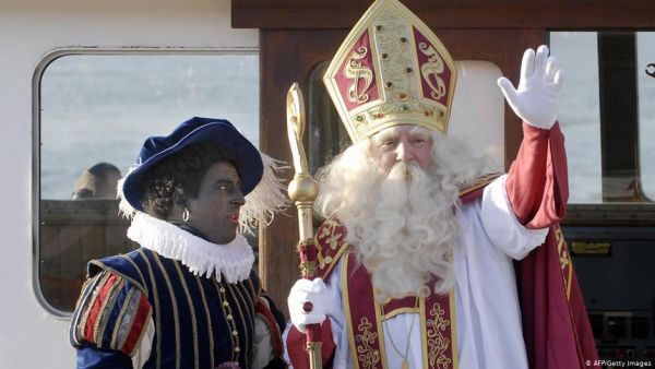 Sinterklaas, the Dutch Santa Claus, has a contentious helper in the Netherlands. "Zwarte Piet" or Black Pete has a painted black face, bright red-colored lips and a curly Afro wig. (AFP)