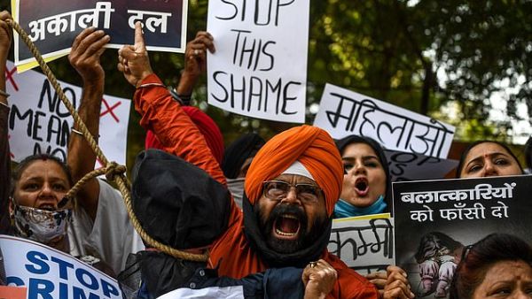 Protesters in New Delhi on October 4 demand action following the gang-rape and murder of a 19-year-old woman. (AFP/File)