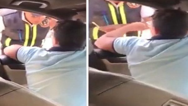 مراهق يقود سيارة فارهة ويعتدي على رجل مرور في مصر