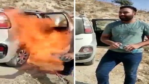 فلسطيني يحرق سيارته الفرنسية