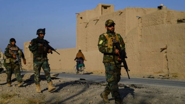 Afghan National Army (ANA) and Afghan Local Police (ALP) forces patrol during a cleaning operation in Pashtun Zarghun district of Herat province on November 28, 2020.  Hoshang Hashimi / AFP