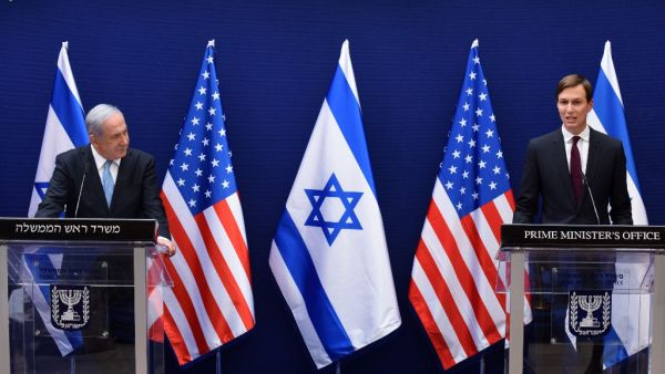 In this file photo taken on August 30, 2020 Israeli Prime Minister Benjamin Netanyahu (L) and US Presidential Adviser Jared Kushner make joint statements to the press after their meeting in Jerusalem, about the Israel - United Arab Emirates agreement to normalise relations. The United Arab Emirates is getting top-of-the-line fighter jets. DEBBIE HILL / POOL / AFP