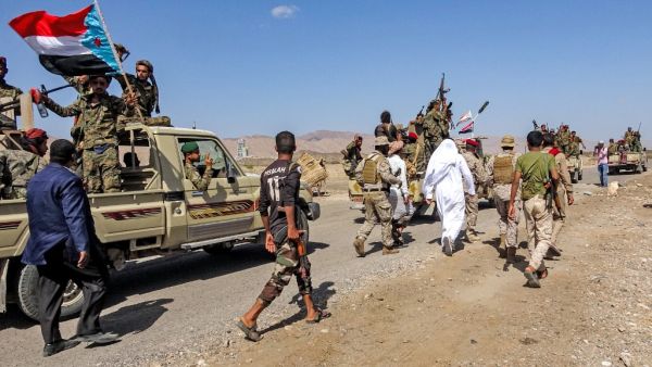 Fighters loyal to Yemen's separatist Southern Transitional Council (STC) travel in a convoy in Yemen's southern Abyan province, on December 13, 2020, as part of a withdrawal according to a power sharing agreement brokered in the Saudi capital Riyadh days earlier. Yemen's internationally recognised government and southern separatists are expected to form a cabinet within the week according to Saudi officials, kicking off the implementation of a Riyadh-sponsored power sharing agreement. The agreement struck l