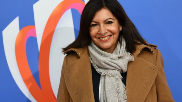 Paris' city mayor Anne Hidalgo poses on the red carpet as she arrives on December 14, 2020 in Paris, to attend the draw for the 2023 Rugby Union World Cup pool stages which will be hosted by France. FRANCK FIFE / AFP