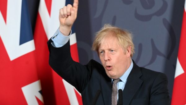 Britain's Prime Minister Boris Johnson gestures as he holds a remote press conference to update the nation on the post-Brexit trade agreement, inside 10 Downing Street in central London on December 24, 2020. Britain said on Thursday, December 24, 2020 an agreement had been secured on the country's future relationship with the European Union, after last-gasp talks just days before a cliff-edge deadline. Paul GROVER / POOL / AFP