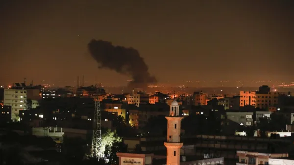 Smoke and flames are seen following an Israeli air strike in Gaza city, on December 26, 2020. MAHMUD HAMS / AFP