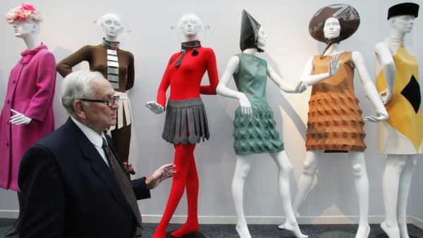 This file photo taken on November 9, 2006 shows French designer Pierre Cardin posing with his new fashion space, in Saint-Ouen. French fashion designer Pierre Cardin, hailed for his visionary creations but also for bringing stylish clothes to the masses, died on December 29, 2020 aged 98, his family told AFP. Cardin who was born in Italy in 1922 but emigrated to France as a small child, died in a hospital in Neuilly in the west of Paris, his family said. FRANCOIS GUILLOT / AFP