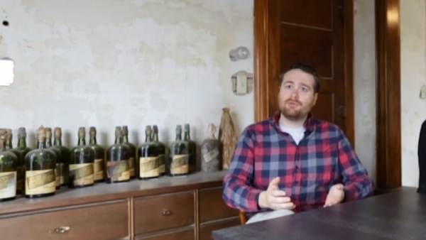 Nick Drummond and Patrick Bakker said they had heard while preparing to purchase their home in Ames that it might have belonged to a bootlegger in the 1920s. (Screenshot/ Video)