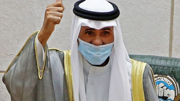 Emir of Kuwait Sheikh Nawaf Al-Ahmad Al-Jaber al-Sabah gestures in greeting upon arrival to attend the opening of the 5th regular session at the country's National Assembly (parliament) in Kuwait City on October 20, 2020. (File/AFP)